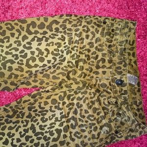 Cheetah print distressed skinny jeans